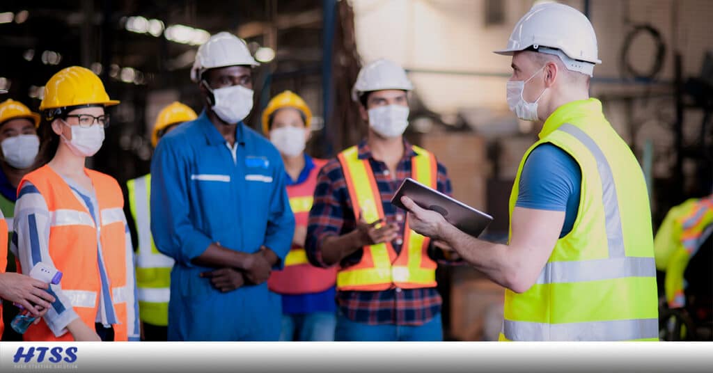 Warehouse Workers Wearing Masks | HTSS Inc.